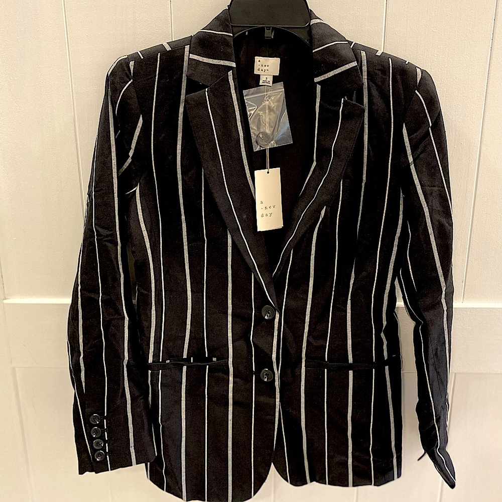 A blue and white striped sports jacket, size 2, brand name is a new day.